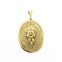 Vintage gold pendant with flower