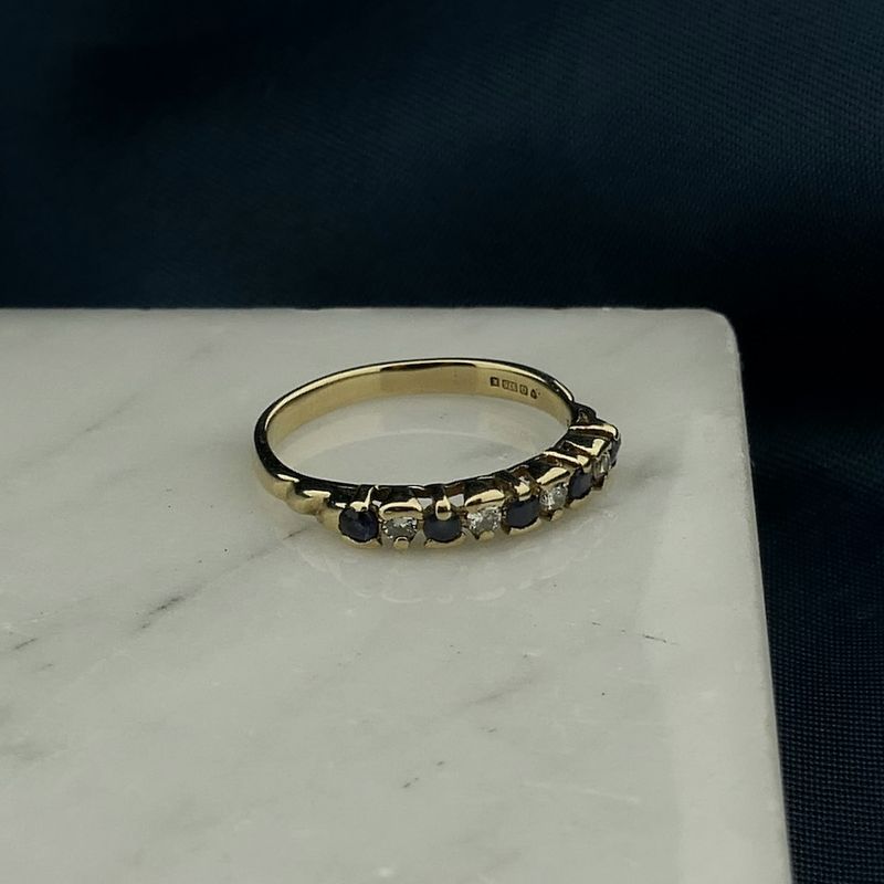 Image 2 of 9 carat row ring with sapphire and diamond | 0.12 ct.