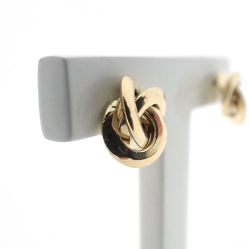 Image 3 of Gold stud earrings as a button