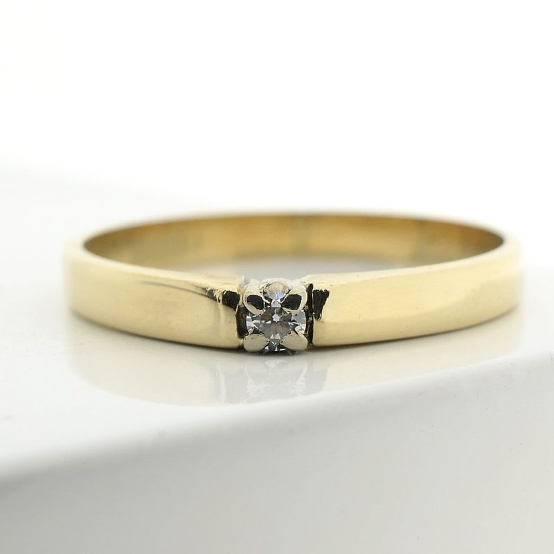 Image 4 of 18 carat gold solitaire ring with 0.05 ct diamond.