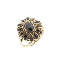Vintage gold entourage ring with garnet