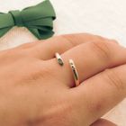 Image 4 of 18-karat two-tone gold solitaire ring with 0.025 ct. diamond