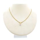 Image 3 of Two-tone gold minimalist pendant with diamond; 0.035 ct.
