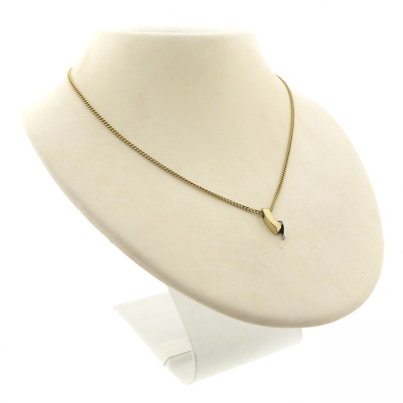 Image 4 of Two-tone minimalist pendant with diamond | 0.015 ct.