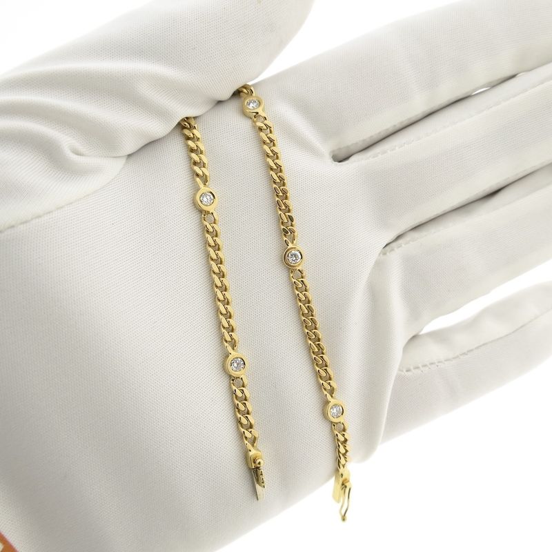 Image 10 of Gold flat gourmet link bracelet with 0.50 ct diamond.