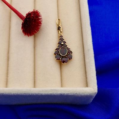 Golden Pendant with Garnet Image 2 of Golden Pendant with Garnet