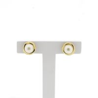 Gold stud earrings with pearl