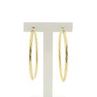 Image 1 of Gold twisted earrings | Ø 54.5 mm