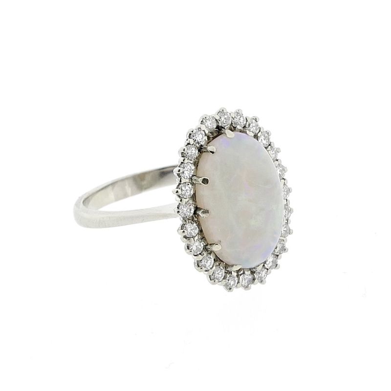 Image 8 of 18-karat white gold ring with opal and entourage of diamonds | 0.60 ct.