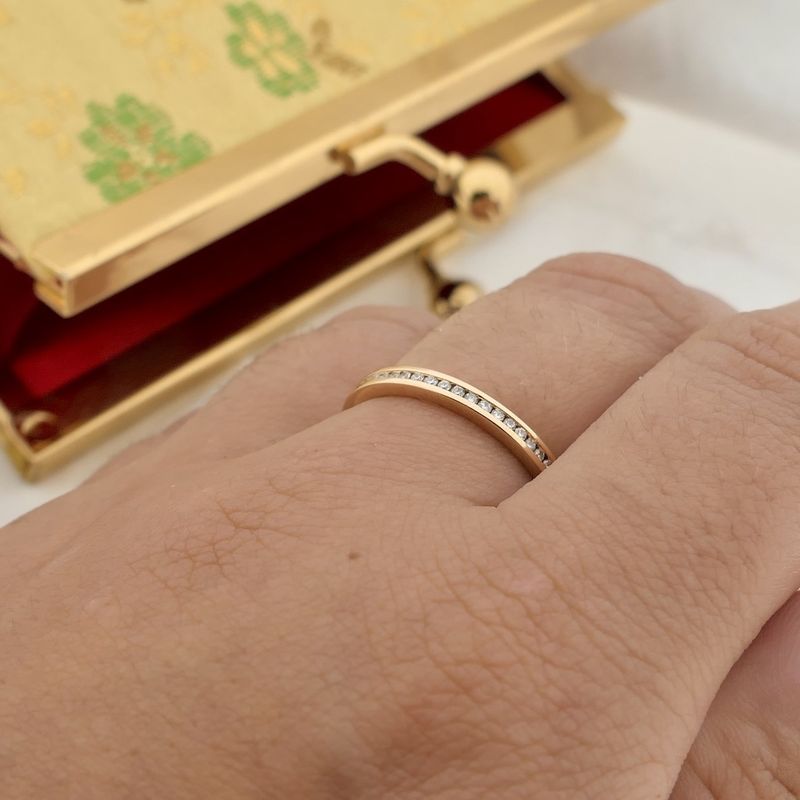 Image 8 of Gold ring with emerald and diamond; 0.10 ct.