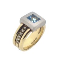 Two-tone gold ring with topaz and diamonds; 0.12 ct.