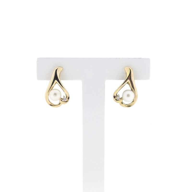Image 1 of Gold stud earrings with pearl and diamond; 0.02 ct.