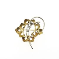 Two-tone gold floral brooch with diamonds