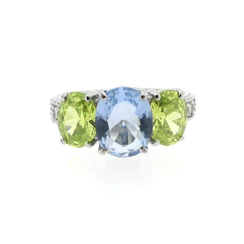 Image 7 of Silver ring with zirconia stones.