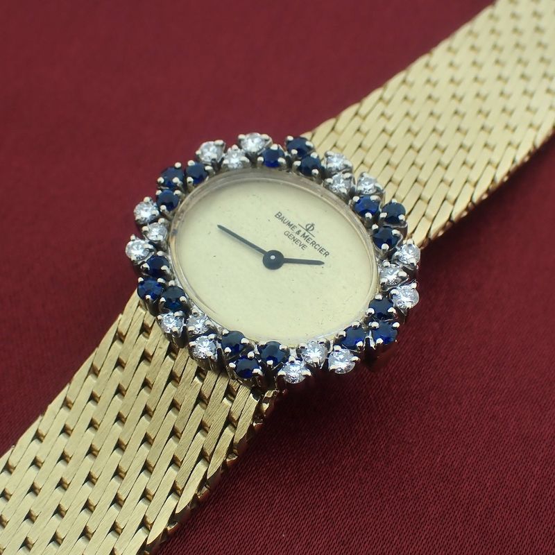 Image 12 of Baume Mercier Vintage; 14k. gouden horloge met briljanten en saffier