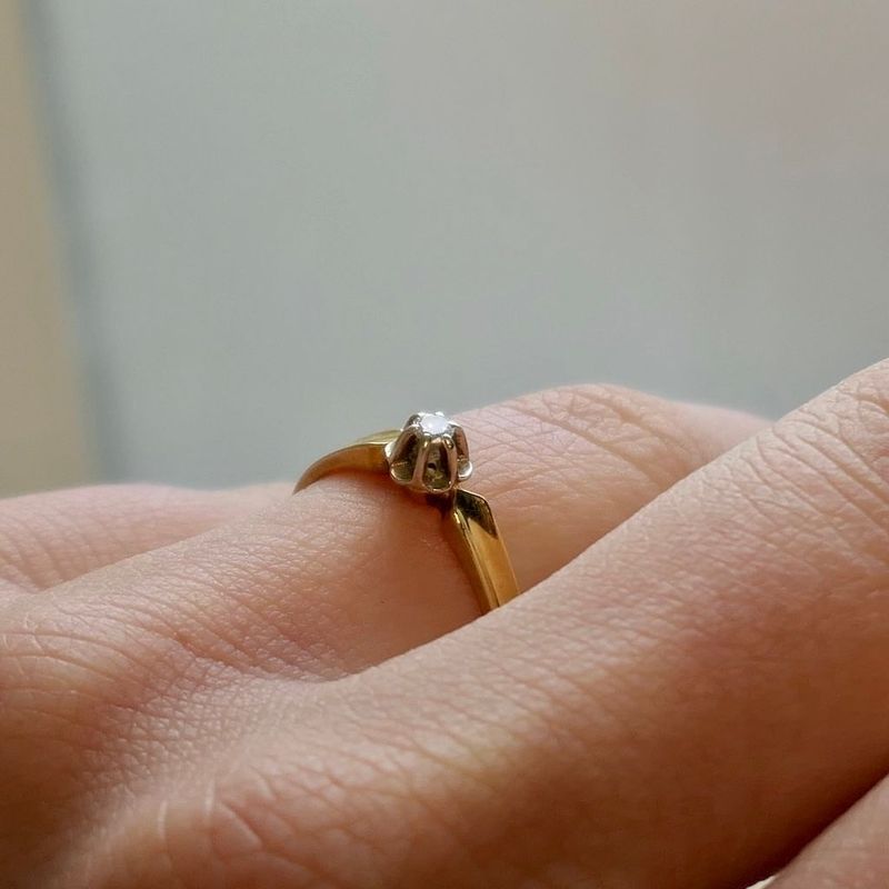 Image 7 of Gold solitaire ring with diamond; 0.03 ct.