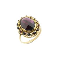 Vintage gold entourage ring with garnet