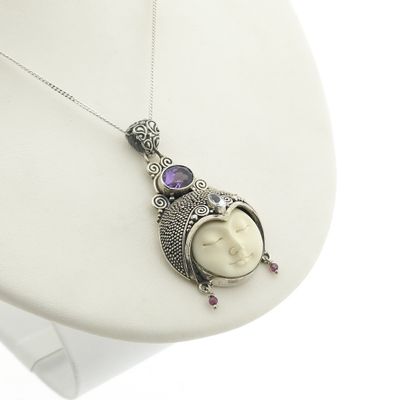 Silver pendant with the face of a sleeping moon Image 2 of Silver pendant with the face of a sleeping moon