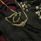 Image 2 of Two-tone gold necklace with fixed pendant and diamond; 0.005 ct.