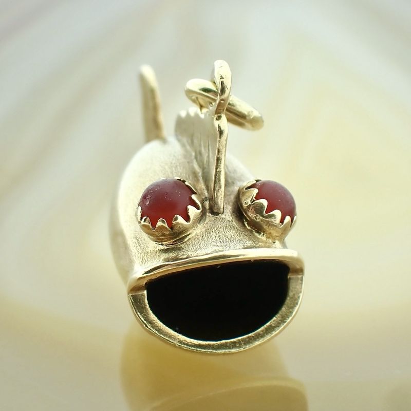 Image 4 of Gold pendant of a pufferfish with carnelian eyes