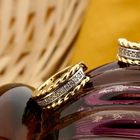 Image 2 of Bicolor gold earrings with diamonds; 0.10 ct.