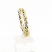 Gold Bismarck link bracelet with 0.4 ct diamond.