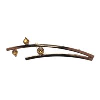Golden fantasy brooch with citrine