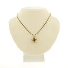 Image 3 of Gold pendant with emerald and diamond | 0.05 ct.