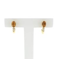 Gold stud earrings with citrine and diamonds; 0.08 ct.