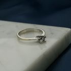 Image 2 of White gold solitaire ring with 0.14 ct diamond.