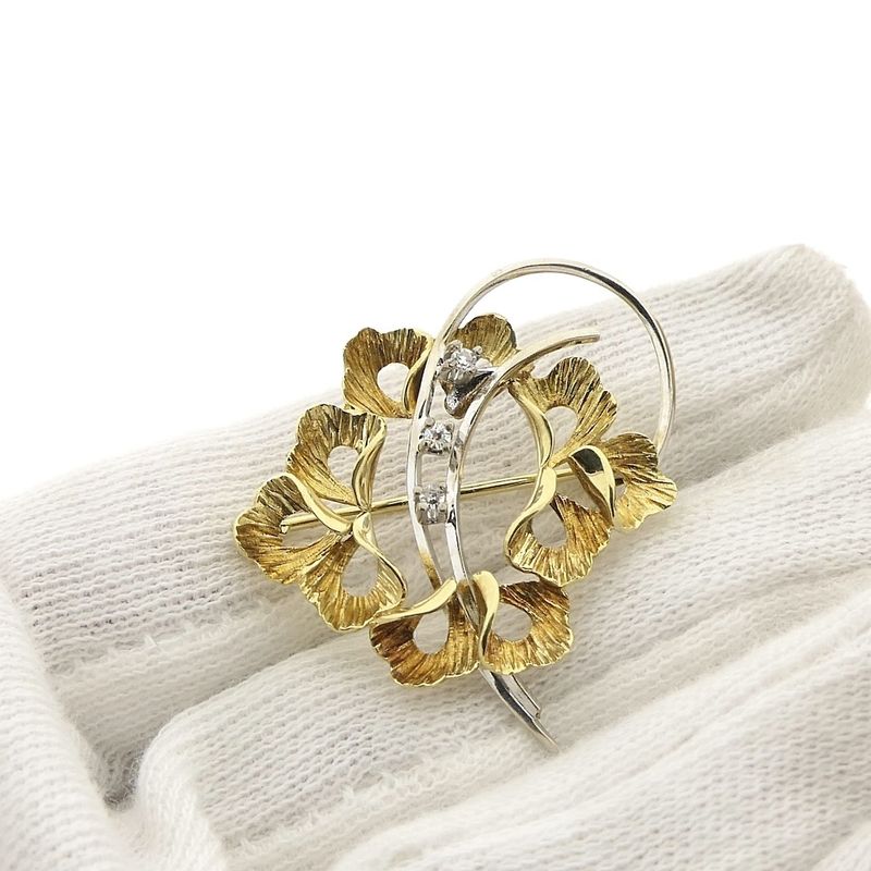 Image 7 of Two-tone gold floral brooch with diamonds