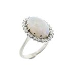 Image 1 of 18-karat white gold ring with opal and entourage of diamonds | 0.60 ct.