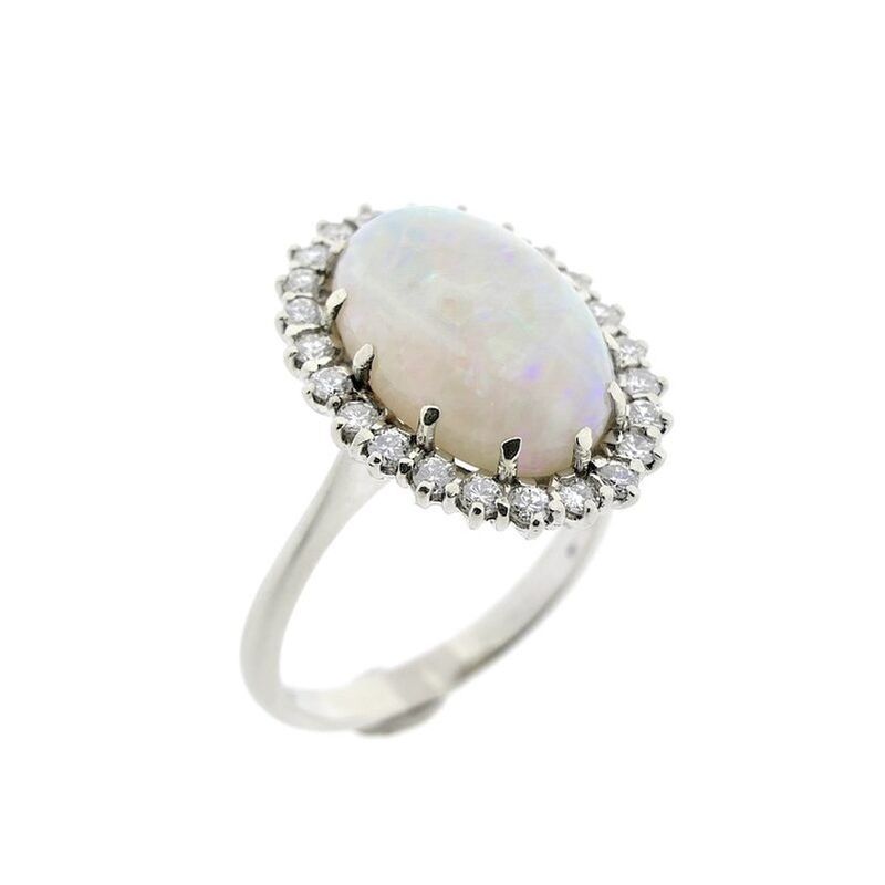 Image 1 of 18-karat white gold ring with opal and entourage of diamonds | 0.60 ct.