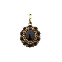 Gold pendant with garnet