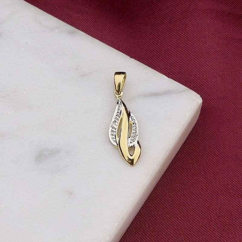 Image 2 of Two-tone gold pendant with diamond; 0.005 ct.