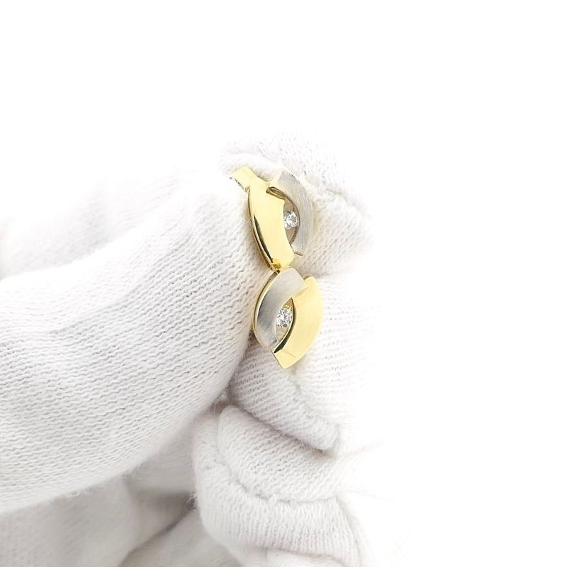 Image 10 of Bicolor gold stud earrings with zirconia