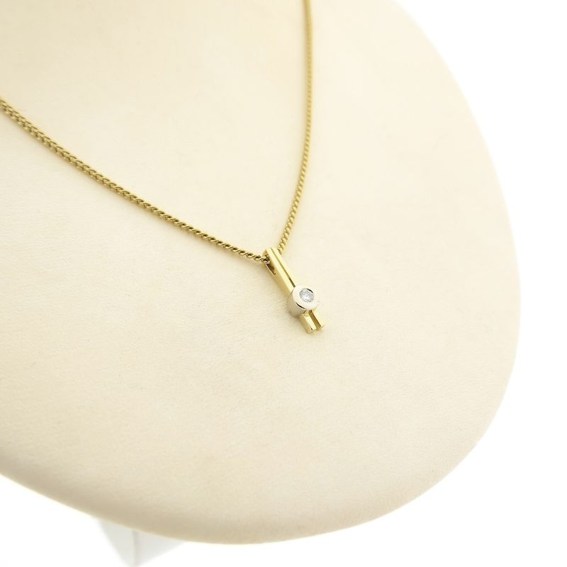 Image 4 of Two-tone gold minimalist pendant with diamond | 0.05 ct.