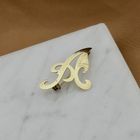 Image 7 of Gold brooch of the letter A