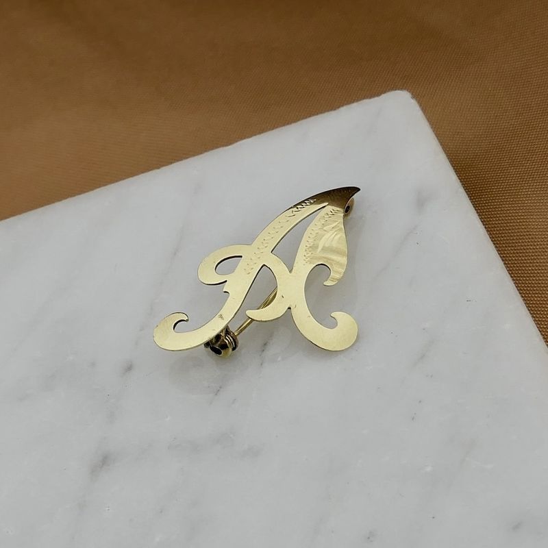 Image 7 of Gold brooch of the letter A