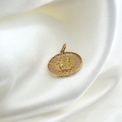 Image 2 of 18 kt gold pendant of the Gemini zodiac sign