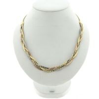 Exclusive gold braided omega link necklace.
