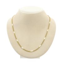 Two-tone gold Figaro/gourmet link chain