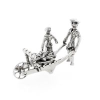 Antique silver statuette of a man and woman with a wheelbarrow