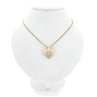 Image 3 of Bicolor gold heart pendant set with diamonds; Approx. 0.70 ct.