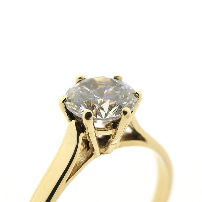 Image 9 of Gold solitaire ring with zirconia