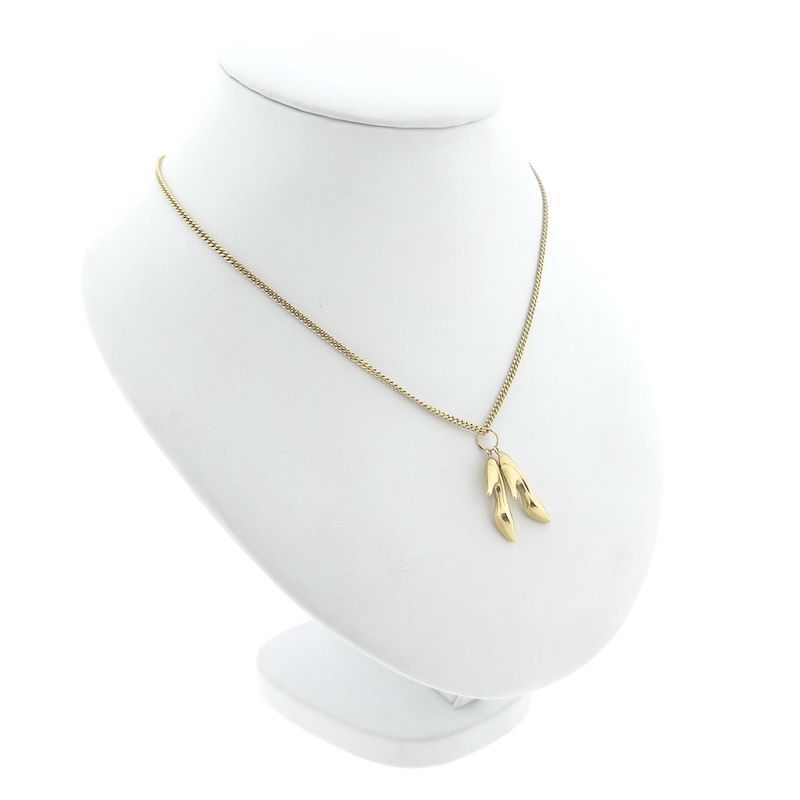 Image 6 of Gold pendant of two pumps