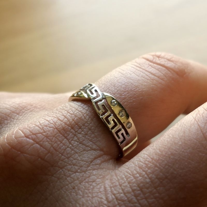 Image 2 of Two-tone gold ring with a meander pattern and zirconia