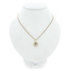 Image 3 of Two-tone gold flower pendant with ruby ​​and diamond | 0.06 ct.