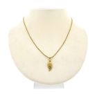 Image 4 of Gold pendant of a half heart with a woman