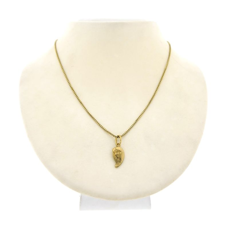 Image 4 of Gold pendant of a half heart with a woman